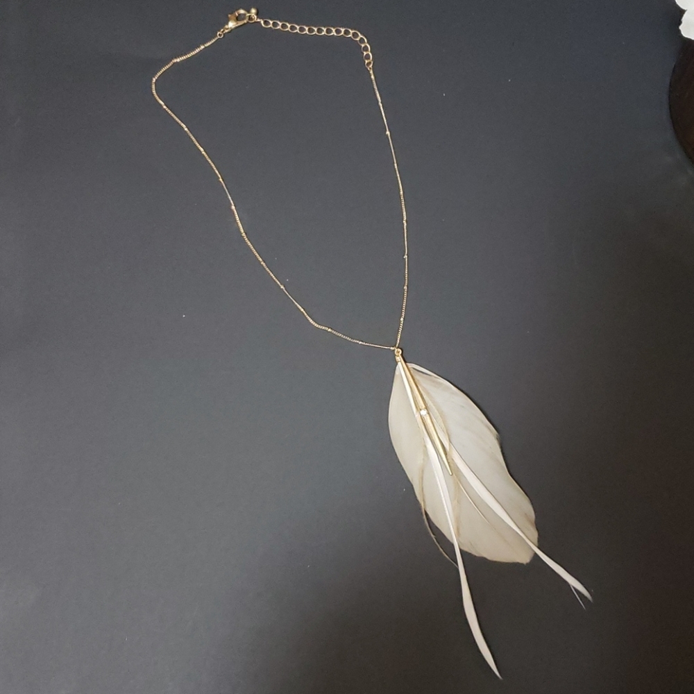 Francesca's gold chained feather necklace